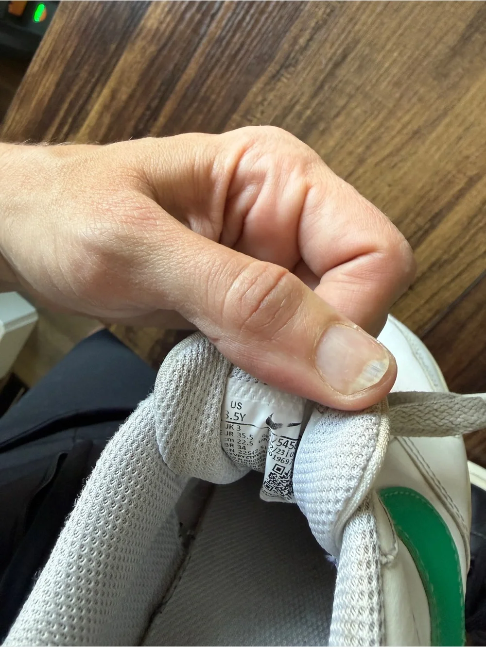 Nike White Low-Top Sneakers with Green Swoosh